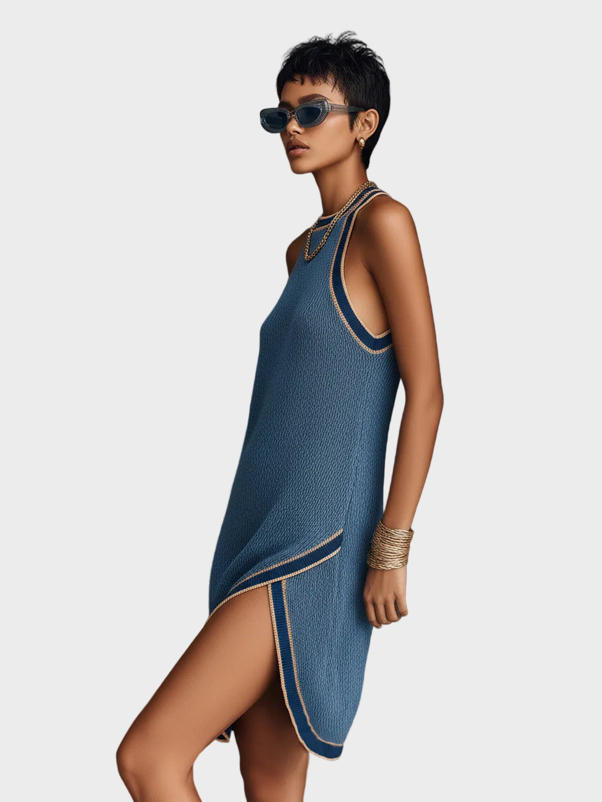 Tina - Κομψό Casual Πλεκτό Mini Φόρεμα σε Μπλε Colorblock, με Στρογγυλή Λαιμόκοψη, Αμάνικο, σε Χαλαρή Γραμμή και Ασύμμετρο Τελείωμα (Chic Casual Blue Colorblock Round Neck Sleeveless Loose-Fit Irregular Hem Knit Mini Dress)